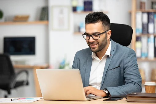 Portrait of a handsome young businessman working in office